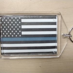 Keychain with Police Flag and Photo on the other side.